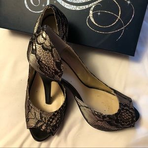 Black and nude lace peep toe pumps